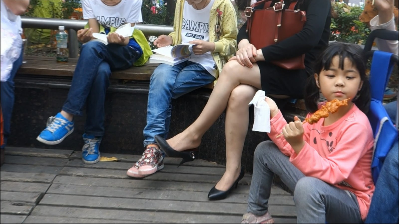 Serious woman with charming dangling